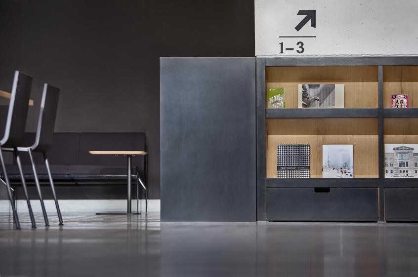 The Ludwigsburg Cultural Centre Ears In Renewed Splendour With The Reception Desk At Entrance Is In Form Of A Solid Dark Monolith Corian Surface That Reveals Warm Oak Interior Only When Opened Out